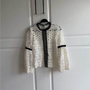 Elegant Lace Blouse with Black Accents